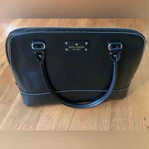 Black Kate Spade satchel with duster bag